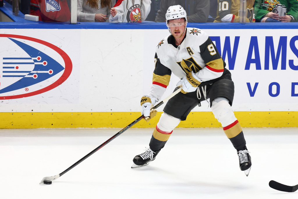 FILE - Vegas Golden Knights center Jack Eichel (9) skates with the puck during the third period of an NHL hockey game against the Buffalo Sabres Saturday, March 15, 2025, in Buffalo, N.Y. (AP Photo/Jeffrey T. Barnes, File)