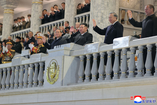 In this photo provided by North Korean government, North Korean leader Kim Jong Un, third right, Chinese Premier Li Qiang, fourth right, Vietnamese Communist Party General Secretary To Lam, second right, Russian Security Council Deputy Chairman Dmitry Medvedev, right, attend the military parade marking the 80th anniversary of the founding of the ruling Worker's Party, in Pyongyang, North Korea, Friday, Oct. 10, 2025. Independent journalists were not given access to cover the event depicted in this image distributed by the North Korean government. The content of this image is as provided and cannot be independently verified. Korean language watermark on image as provided by source reads: "KCNA" which is the abbreviation for Korean Central News Agency. (Korean Central News Agency/Korea News Service via AP) In this photo provided by North Korean government, North Korean leader Kim Jong Un, third right, Chinese Premier Li Qiang, fourth right, Vietnamese Communist Party General Secretary To Lam, second right, Russian Security Council Deputy Chairman Dmitry Medvedev, right, attend the military parade marking the 80th anniversary of the founding of the ruling Worker's Party, in Pyongyang, North Korea, Friday, Oct. 10, 2025. Independent journalists were not given access to cover the event depicted in this image distributed by the North Korean government. The content of this image is as provided and cannot be independently verified. Korean language watermark on image as provided by source reads: "KCNA" which is the abbreviation for Korean Central News Agency. (Korean Central News Agency/Korea News Service via AP)