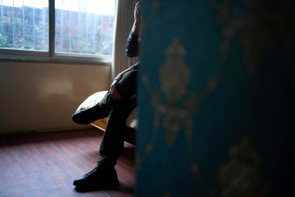 A Tibetan living in exile shares his story during an interview in Kathmandu, Nepal, April 14, 2025. (AP Photo/Niranjan Shrestha)