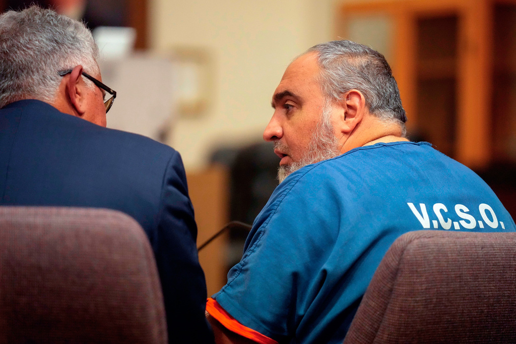 FILE - Attorney Ron Bamieh, left, listens to his client Loay Abdelfattah Alnaji in Ventura County Superior Court on Nov. 17, 2023, in Ventura, Calif. (AP Photo/Damian Dovarganes, File)