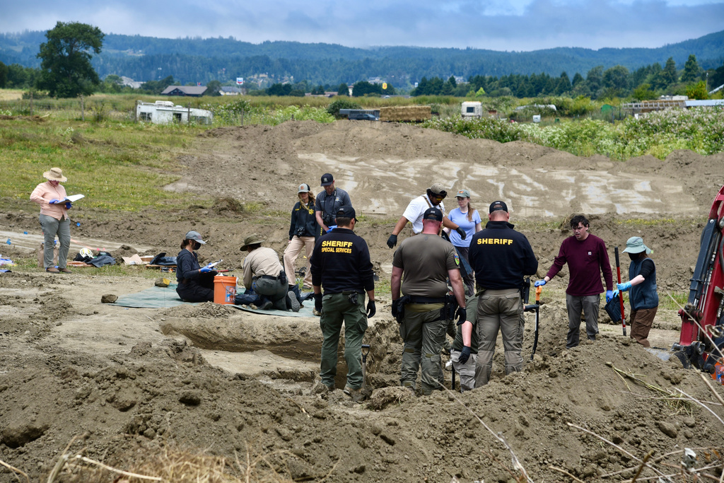 Investigators from the Humboldt County Sheriff's Office search the grounds of Miranda's Rescue Animal Sanctuary in Fortuna, Calif., June 24, 2026, where the remains of at least 117 dogs were found. (Ryan Burns/Lost Coast Outpost via P)