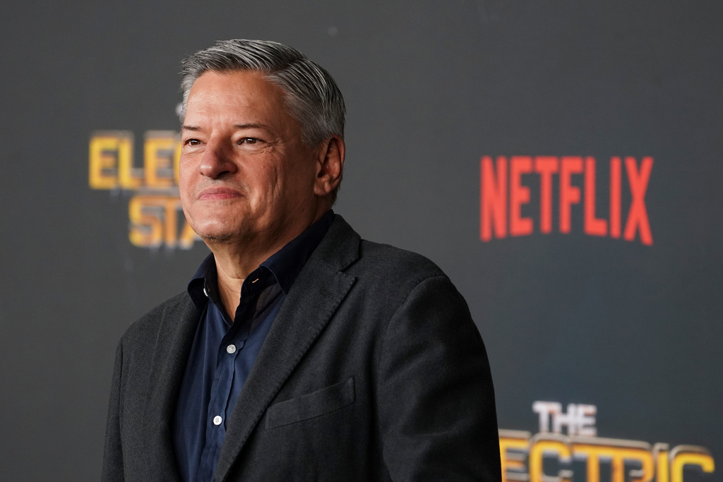 FILE - Ted Sarandos arrives at the premiere of "The Electric State" on Monday, Feb. 24, 2025, at The Egyptian Theatre in Los Angeles. (Photo by Jordan Strauss/Invision/AP, File)