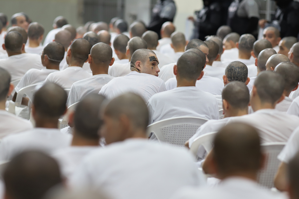 FILE - Alleged gang members take part in a mass trial at the Terrorism Confinement Center (CECOT) in Tecoluca, El Salvador, April 23, 2026. (AP Photo/Salvador Melendez, File)