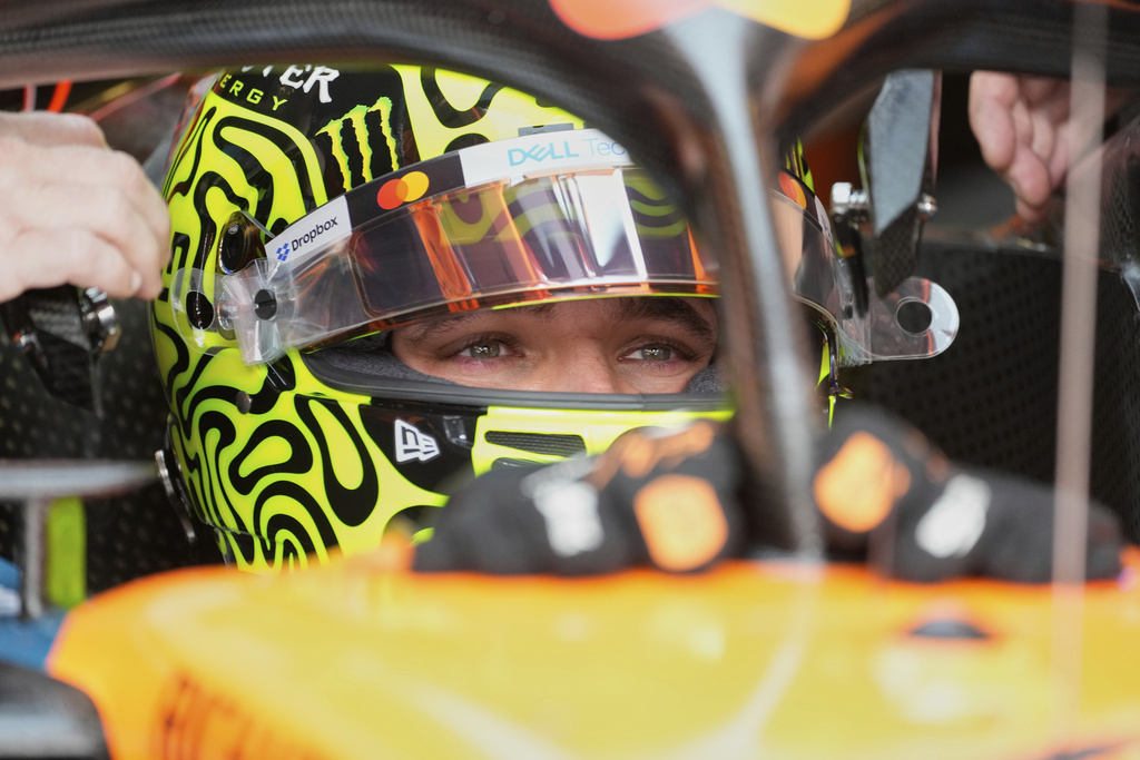 McLaren driver Lando Norris of Britain sits in pit lane during the first training for the Azerbaijan Formula One Grand Prix in Baku, Azerbaijan, Friday, Sept. 19, 2025. (AP Photo/Darko Bandic)
