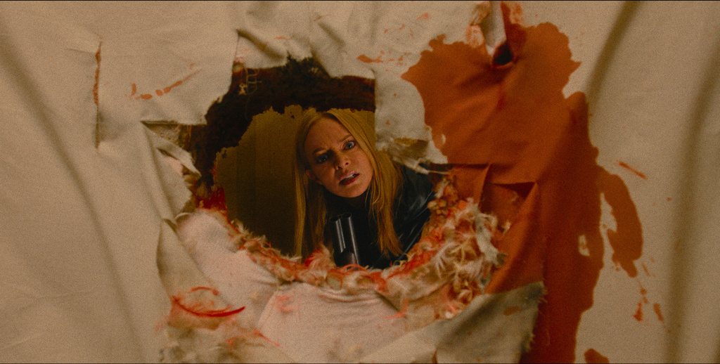 This image released by Warner Bros. Pictures shows Heather Graham in a scene from "They Will Kill You." (Warner Bros. Pictures via AP)