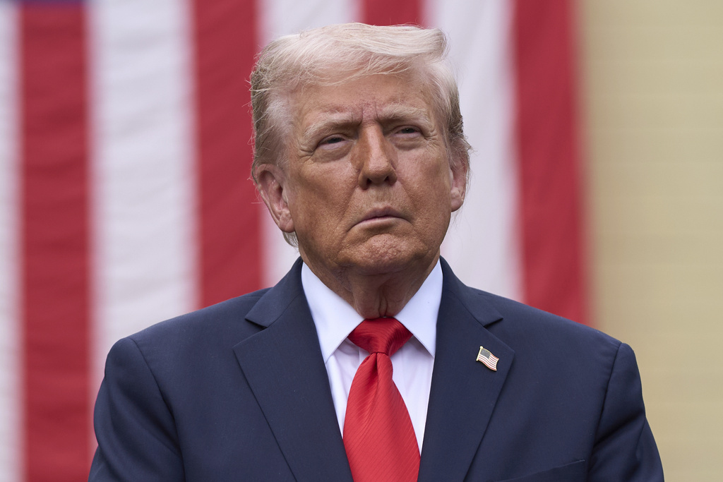 President Donald Trump stands for a moment of silence during a ceremony to commemorate the 24th anniversary of the 9/11 attacks, Thursday, Sept. 11, 2025, at the Pentagon in Washington. (AP Photo/Evan Vucci)