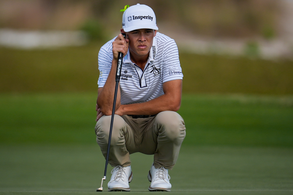 John Keefer lines up a putt on the 13th green during the third round of the RSM Classic golf tournament, Saturday, Nov. 22, 2025, in St. Simons Island, Ga. (AP Photo/Mike Stewart)