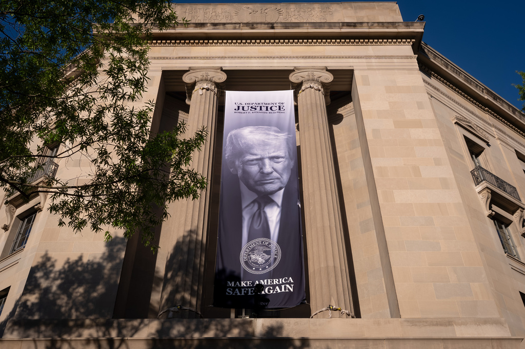 FILE - A portrait of President Donald Trump is displayed at the Justice Department building in Washington, June 2, 2026. (AP Photo/J. Scott Applewhite, File)