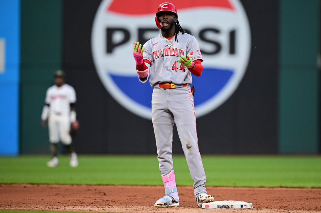 Cincinnati Reds shortstop Elly de la Cruz celebrates after hitting an RBI double during the fifth inning of a baseball game against the Cleveland Guardians, Friday, May 15, 2026, in Cleveland. (AP Photo/David Dermer)