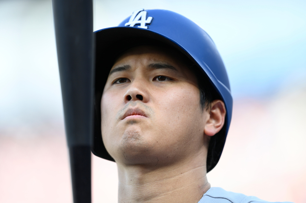 Los Angeles Dodgers' Shohei Ohtani stands on deck during the second inning of a baseball game against the Washington Nationals, Saturday, April 4, 2026, in Washington. (AP Photo/Nick Wass)