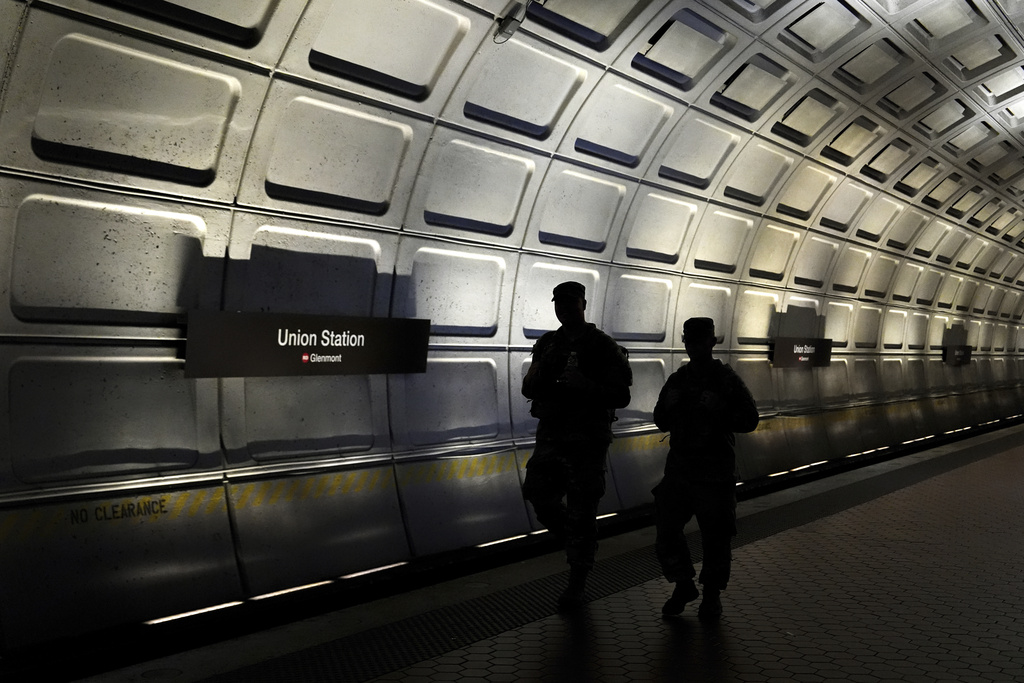 South Carolina National Guardsmen patrol inside the Union Station metro, Thursday, Aug. 21, 2025, in Washington. (AP Photo/Julia Demaree Nikhinson)