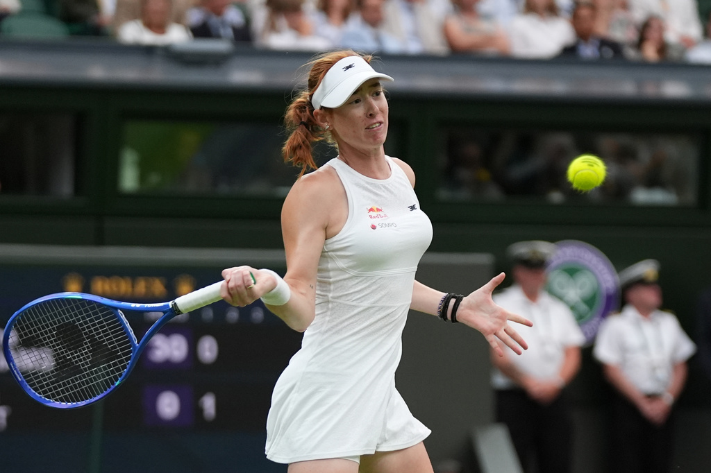 Maya Joint of Australia plays a forehand against Serena Williams of the United States in their first round women's singles match at the Wimbledon Tennis Championships in London, Tuesday, June 30, 2026. (AP Photo/Maja Smiejkowska)