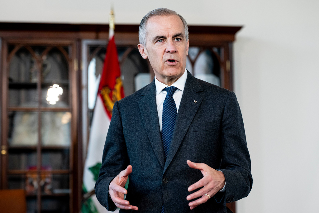 Canada Prime Minister Mark Carney speaks in his office in Ottawa on Monday, March 9, 2026. (Spencer Colby/The Canadian Press via AP)