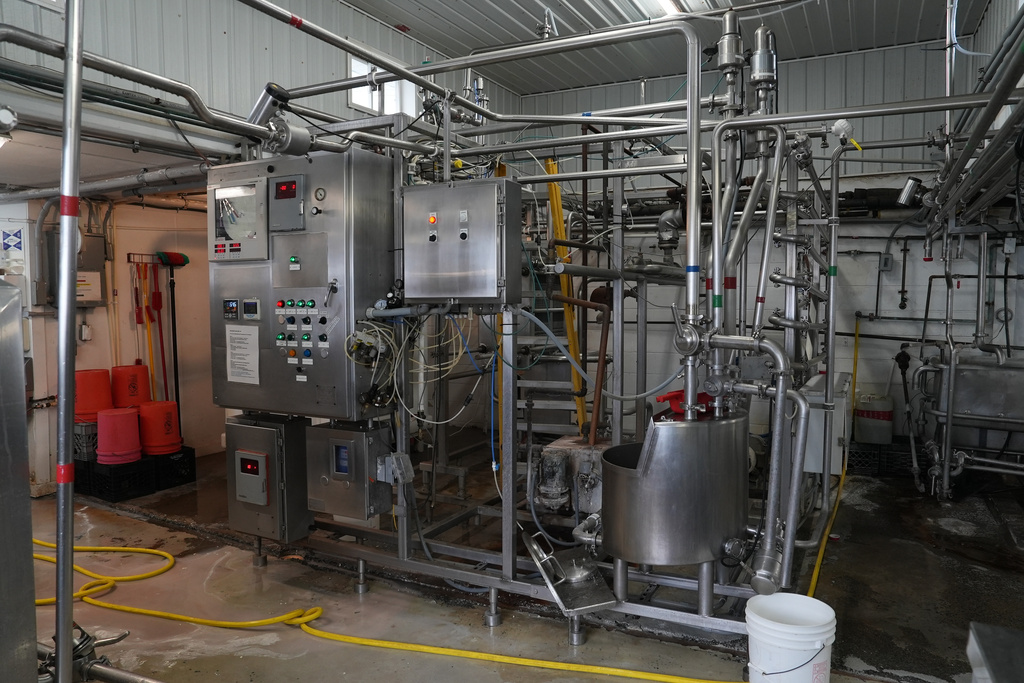 A high-temperature short-time milk pasteurizer at Ronnybrook Farm in Ancramdale, N.Y., on April 22, 2026. (AP Photo/Mary Conlon)