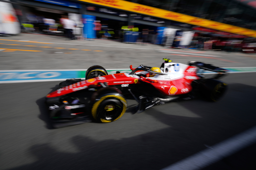 Ferrari driver Lewis Hamilton of Britain leaves the pit lane during the sprint qualifying at the Formula One Dutch Grand Prix in Zandvoort , Netherlands, Friday, Aug. 21, 2026. (AP Photo/Darko Bandic, Pool)