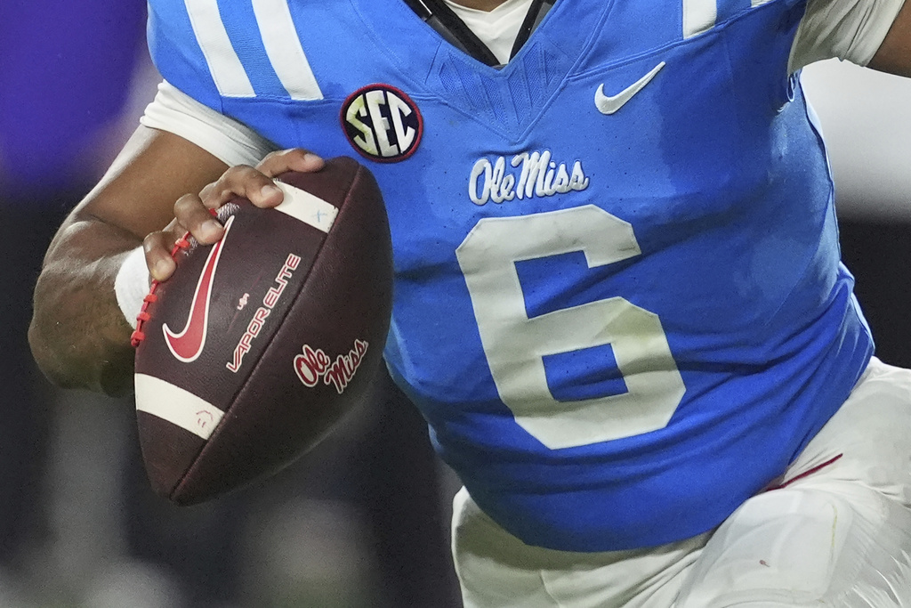 Mississippi quarterback Trinidad Chambliss gets ready to pass the ball against Arkansas during the second half of an NCAA college football game in Oxford, Miss., Saturday, Sept. 13, 2025. (AP Photo/Rogelio V. Solis)