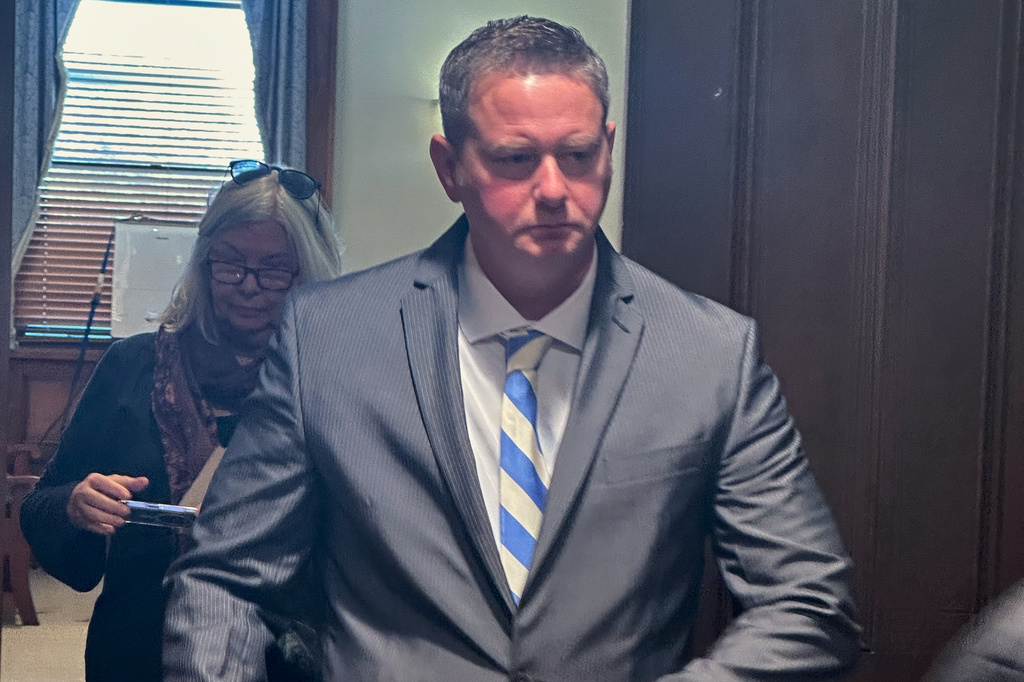 FILE - Former New York state trooper Christopher Baldner, who is charged in the death of an 11-year-old girl, leaves the court room during his trial on Oct. 28, 2025 in Kingston, N.Y. (AP Photo/Michael Hill, File)