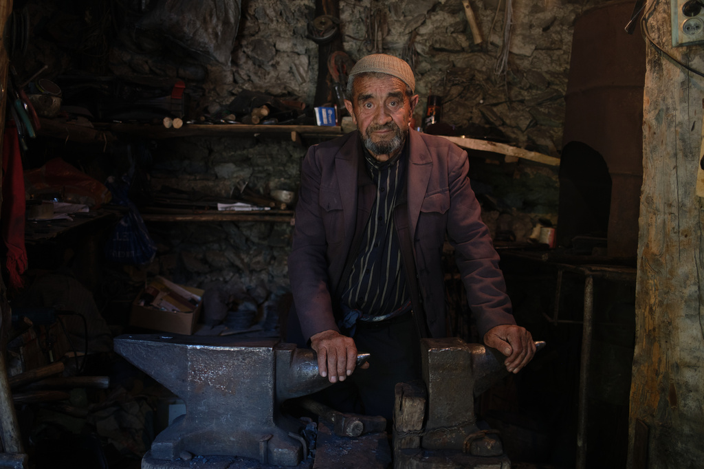 Blacksmith Sultan Ali is photographed with his anvils at his workshop in Voru village, Tajikistan, Tuesday, May 5, 2026. (AP Photo/Jon Orbach)