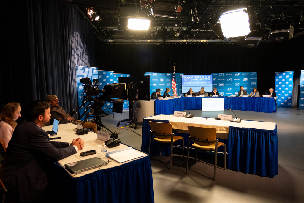 The CDC Advisory Committee on Immunization Practices meets in Atlanta on Friday, Dec. 5, 2025 to consider changes in hepatitis B vaccine recommendations for infants. (AP Photo/Ben Gray)