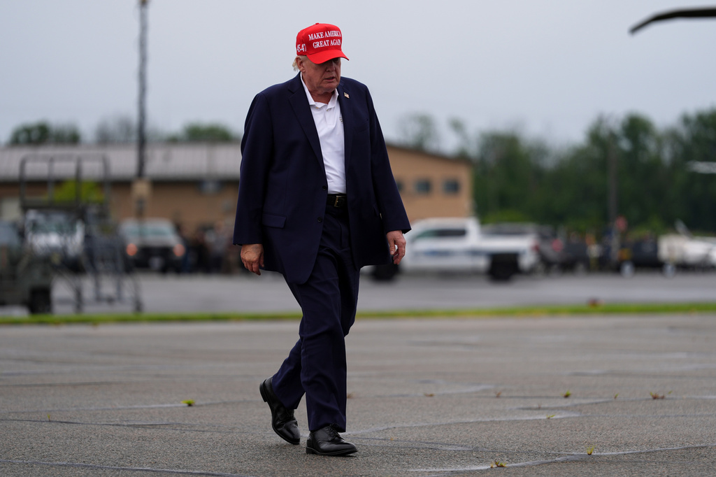 President Donald Trump walks to board Air Force One at Morristown Airport, Sunday, Aug. 16, 2026, in Morristown, N.J. (AP Photo/Julia Demaree Nikhinson)