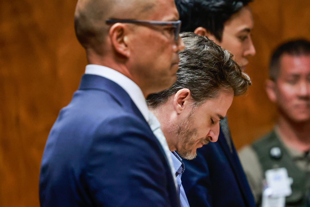 Gerhardt Konig, center, reacts after the verdict is read in court Wednesday, April 8, 2026, in Honolulu. (Jamm Aquino/Honolulu Star-Advertiser via AP, Pool)