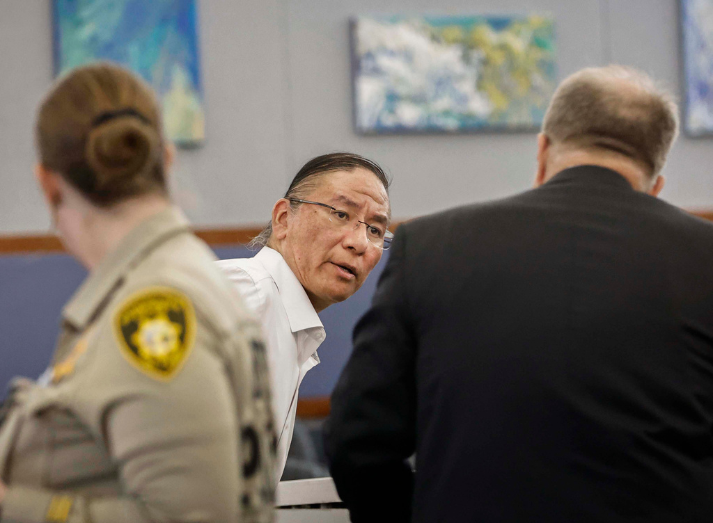Nathan Chasing Horse, center, appears at a hearing before the start of his trial at the Regional Justice Center, Monday, Jan. 12, 2026, in Las Vegas. (Benjamin Hager/Las Vegas Review-Journal via AP)