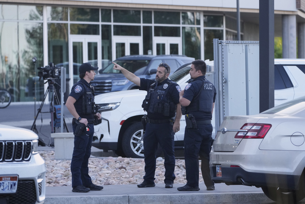 Orem police monitor the campus at Utah Valley University a day after Charlie Kirk was shot and killed, in Orem, Utah, Thursday,, Sept. 11, 2025. (AP Photo/Lindsey Wasson)