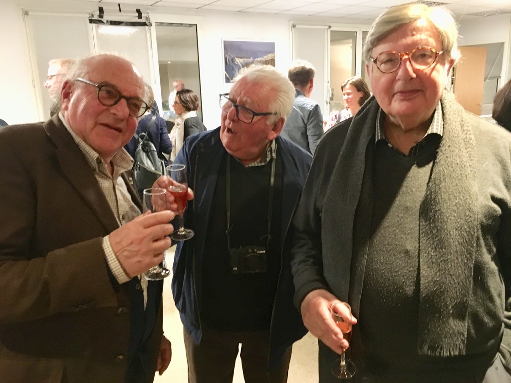 From left, former Associated Press Chief of Assignments Bernard Ferret, former photographer Michel Lipchitz and former Paris Chief Photo Editor Guy Kopelowicz at the AP Paris office on March 22, 2019, in Paris. (AP Photo/Bob Edme)