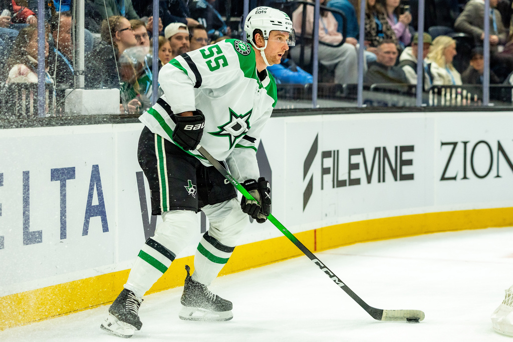 Dallas Stars defenseman Thomas Harley looks to move the puck against the Utah Mammoth during the first period of an NHL hockey game Saturday, Jan. 31, 2026, in Salt Lake City. (AP Photo/Melissa Majchrzak)