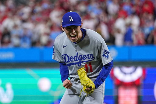 Los Angeles Dodgers pitcher Roki Sasaki reacts after the Dodgers defeated the Philadelphia Phillies in Game 1 of baseball's National League Division Series, Saturday, Oct. 4, 2025, in Philadelphia. (AP Photo/Matt Rourke) Los Angeles Dodgers pitcher Roki Sasaki reacts after the Dodgers defeated the Philadelphia Phillies in Game 1 of baseball's National League Division Series, Saturday, Oct. 4, 2025, in Philadelphia. (AP Photo/Matt Rourke)
