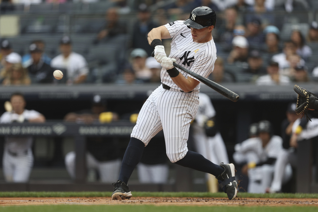 New York Yankees' Ben Rice hits a three-run home run during the first inning of a baseball game against the Toronto Blue Jays, Sunday, Sept. 7, 2025, in New York. (AP Photo/Heather Khalifa)