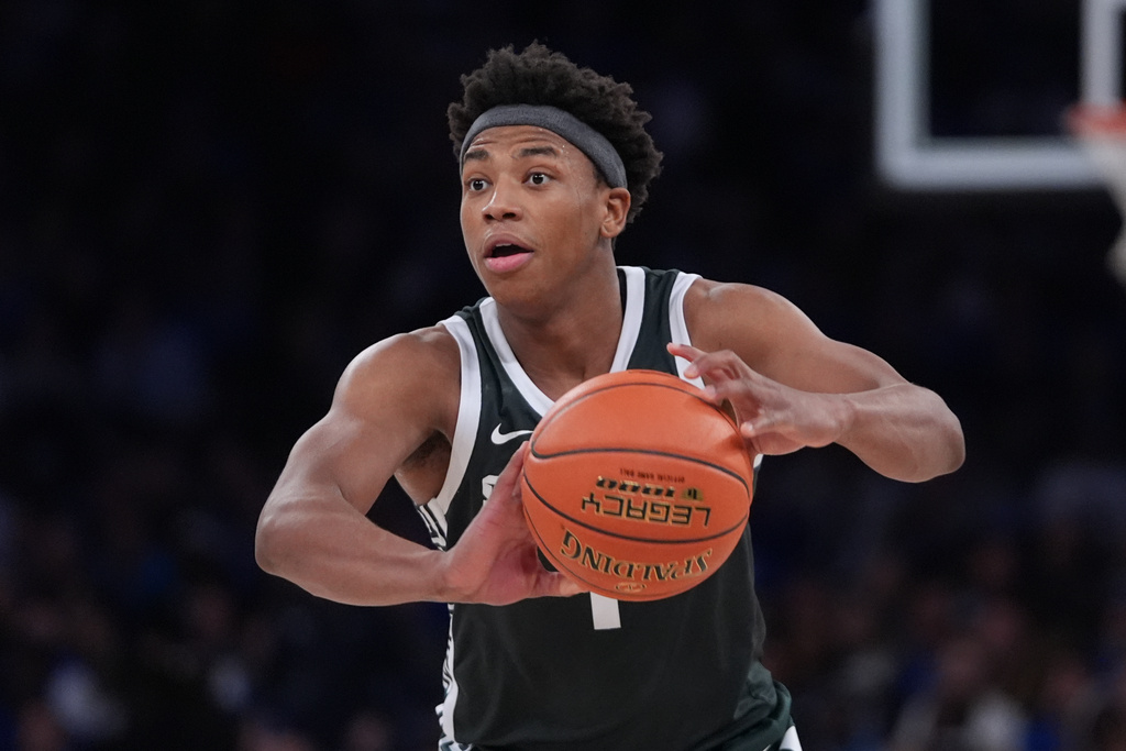 Michigan State's Jeremy Fears Jr. (1) looks to pass during the second half of an NCAA college basketball game against Kentucky Tuesday, Nov. 18, 2025, in New York. (AP Photo/Frank Franklin II)