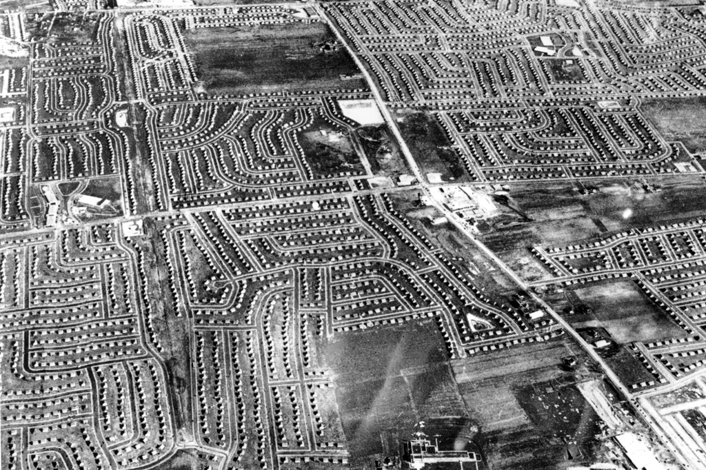 FILE - An aerial view of Levittown, showing its $30,000,000 development of over 10,000 new homes on Long Island, 25 miles from New York, Feb. 25, 1950. (AP Photo, File)