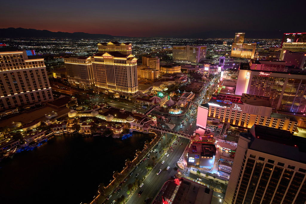 FILE - Cars drive along the Las Vegas Strip, Aug. 2, 2025, in Las Vegas. (AP Photo/John Locher, File)