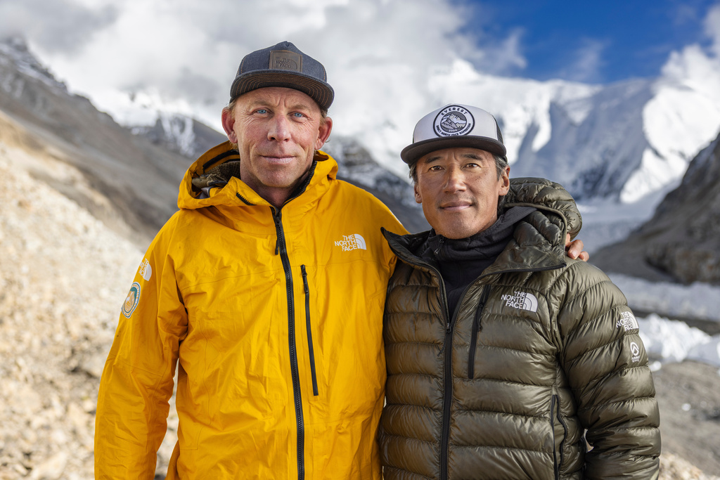 This undated photo provided by National Geographic on Tuesday, Oct. 28, 2025, shows mountaineer Jim Morrison, left, with filmmaker Jimmy Chin. (Savannah Cummins/National Geographic via AP)