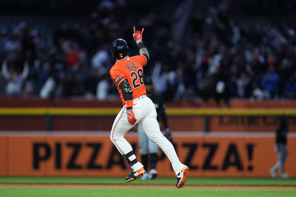 Detroit Tigers' Javier Báez celebrates his home run against the Miami Marlins during the fifth inning of a baseball game Friday, April 10, 2026, in Detroit. (AP Photo/Paul Sancya)