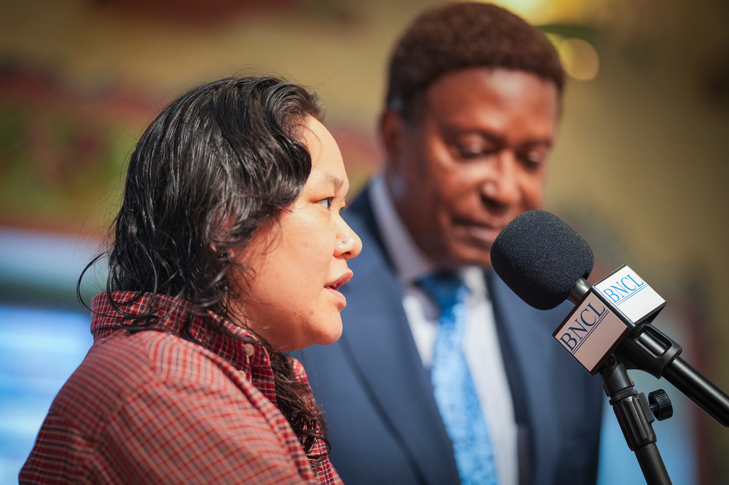 Georgia Savageford speaks during a news conference in Minneapolis, Thursday, March 26, 2026, about being detained by federal agents. (Leila Navidi/Minnesota Star Tribune via AP)