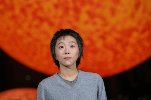 Leah Dou poses for photographers upon arrival at the Chanel Spring/Summer 2026 collection presented in Paris, Monday, Oct. 6, 2025. (AP Photo/Christophe Ena) Leah Dou poses for photographers upon arrival at the Chanel Spring/Summer 2026 collection presented in Paris, Monday, Oct. 6, 2025. (AP Photo/Christophe Ena)