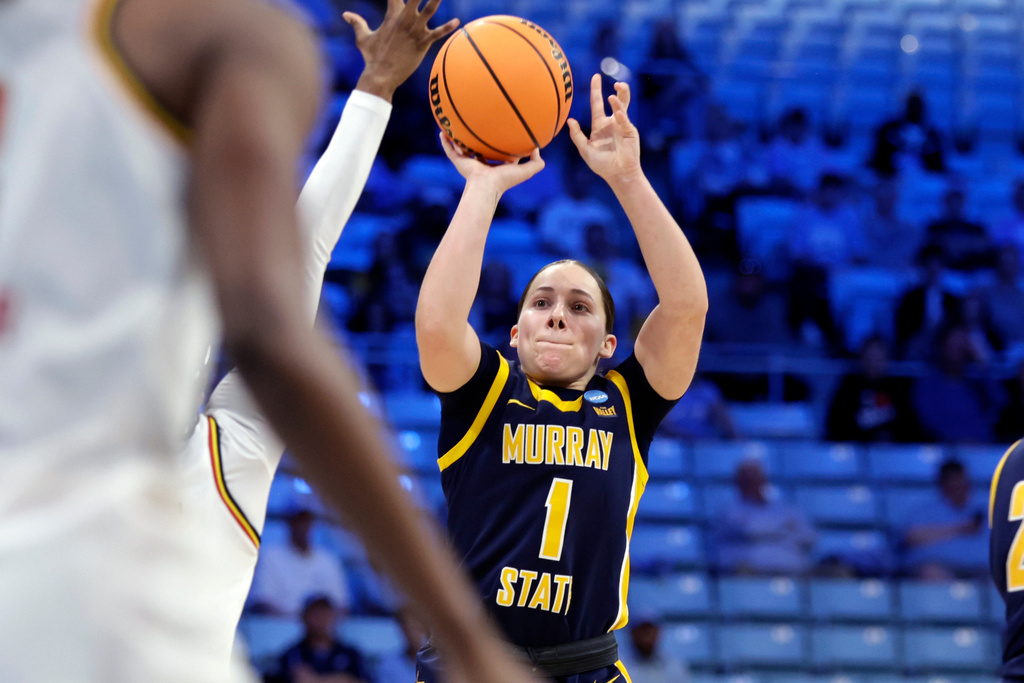 Murray State guard Halli Poock (1) shootsd against Maryland during the first half in the first round of the NCAA college basketball tournament against Maryland, Friday, March 20, 2026, in Chapel Hill, N.C. (AP Photo/Chris Seward)