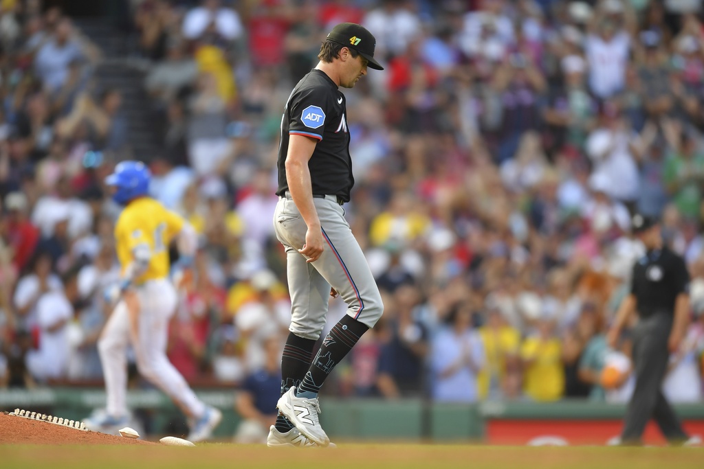 Miami Marlins pitcher Cal Quantrill, right, steps off the mound as Boston Red Sox's Trevor Story, left, runs the bases toward home after hitting a three-run home run in the third inning of a baseball game, Saturday, Aug. 16, 2025, in Boston. (Photo/Steven Senne)