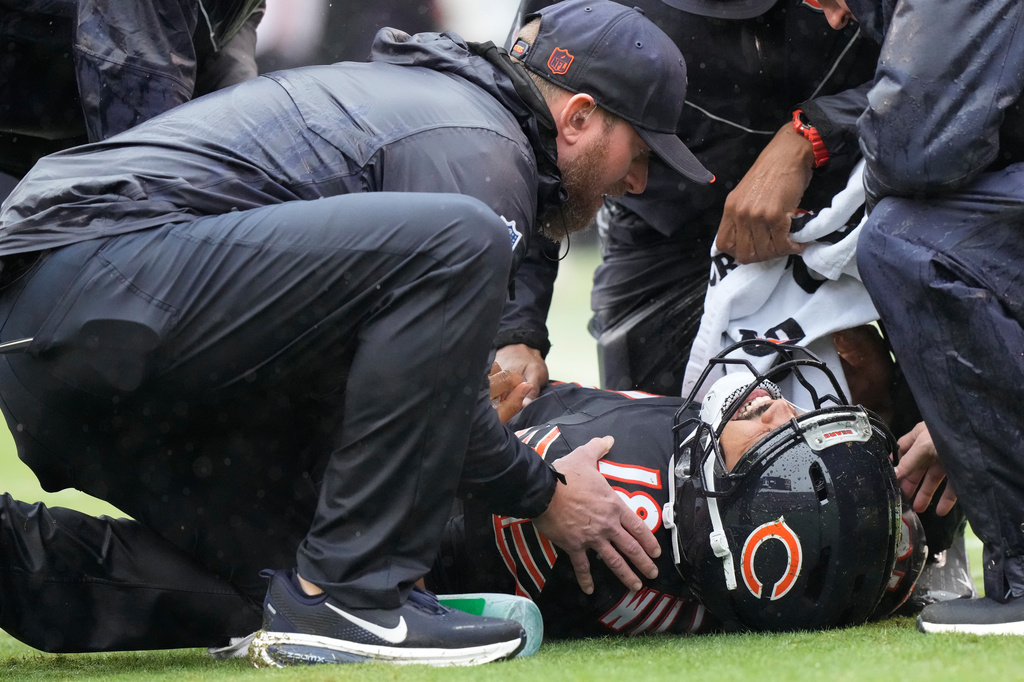 Chicago Bears quarterback Caleb Williams (18) lies on the field during the second half of an NFL football game against the Minnesota Vikings in Chicago, Sunday, Sept. 20, 2026. (AP Photo/Nam Y. Huh)