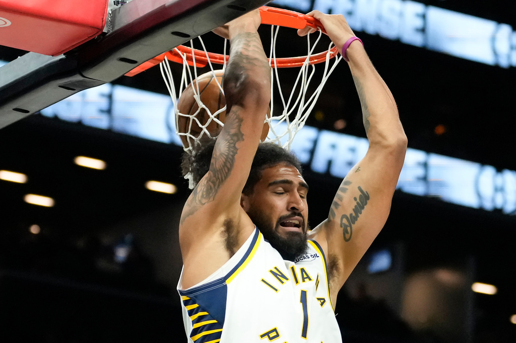 Indiana Pacers forward Obi Toppin (1) dunks during the first half of an NBA basketball game against Brooklyn Nets, Thursday, April 9, 2026, in New York. (AP Photo/Yuki Iwamura)