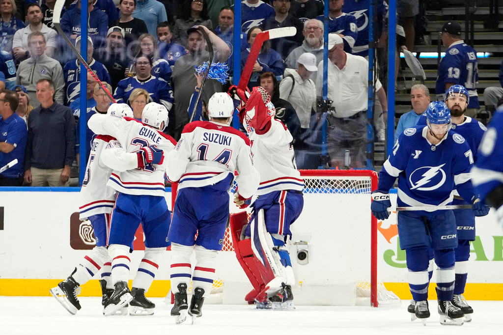 Montréal Canadiens players celebrate after the team defeated the Tampa Bay Lightning in Game 7 of an NHL hockey Stanley Cup first-round playoff series, Sunday, May 3, 2026, in Tampa, Fla. (AP Photo/Chris O'Meara)
