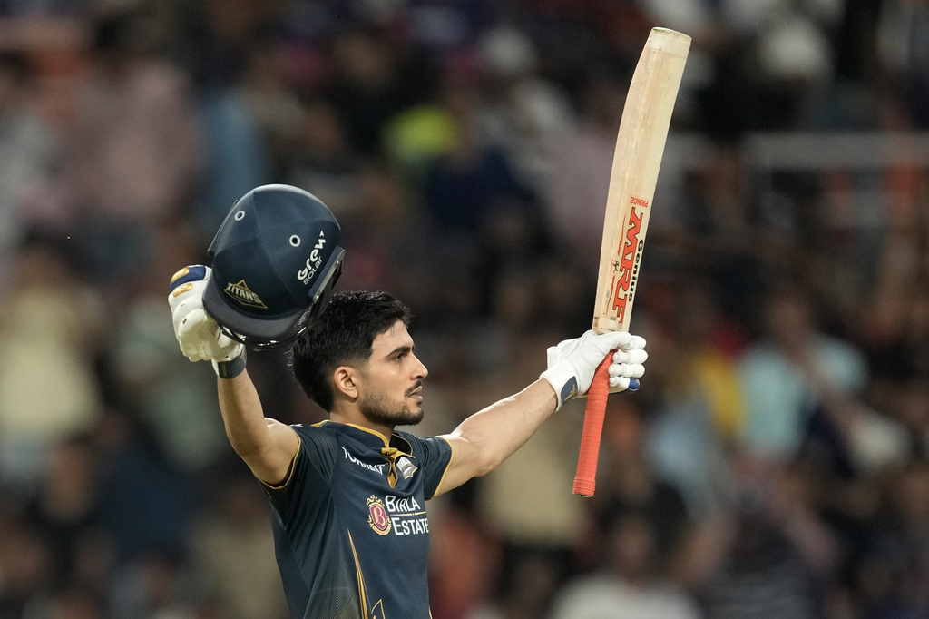 Gujarat Titans' captain Shubman Gill celebrates his century during the Indian Premier League cricket match between Gujarat Titans and Rajasthan Royals in New Chandigarh, India, Friday, May 29, 2026. (AP Photo/Ashwini Bhatia)