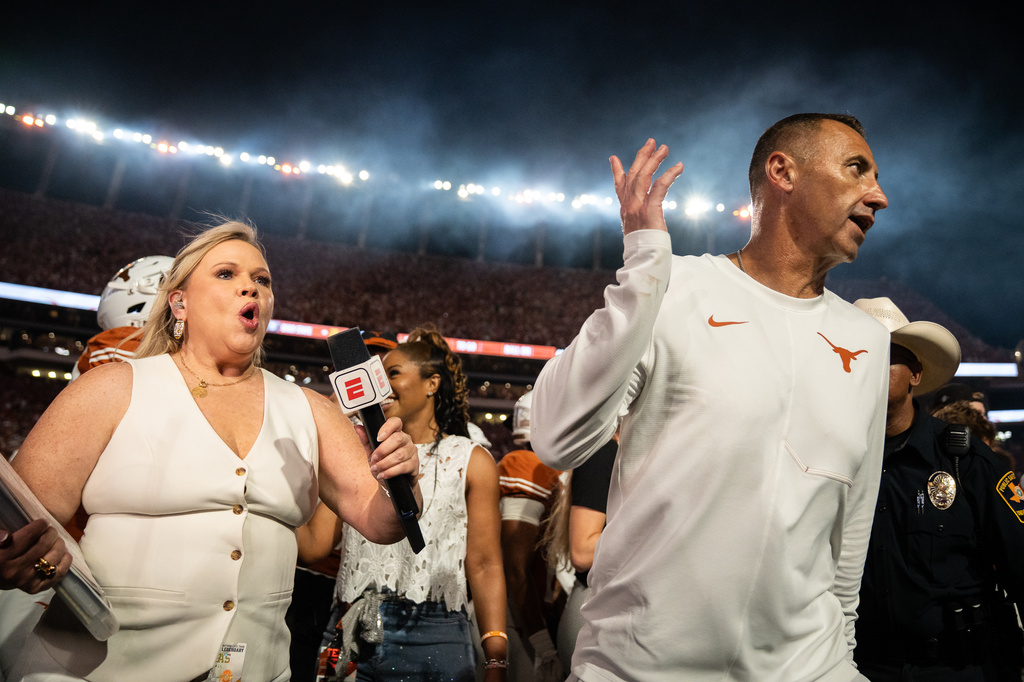 Texas Longhorns head coach Steve Sarkisian walks away from a post-game interview after it was delayed due to technical difficulties following Texas' 24-23 win over Ohio State during an NCAA college football game in Austin, Texas, Saturday, Sept. 12, 2026. (Sara Diggins/The San Antonio Express-News via AP)