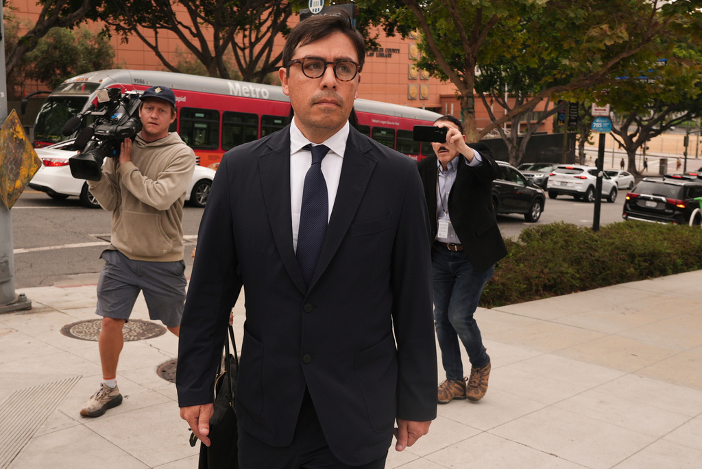 FILE - Dr. Salvador Plasencia leaves federal court on Wednesday, July 23, 2025 in Los Angeles, after pleading guilty to giving ketamine to Matthew Perry, leading up to the actor's 2023 overdose death. (AP Photo/Damian Dovarganes, File)