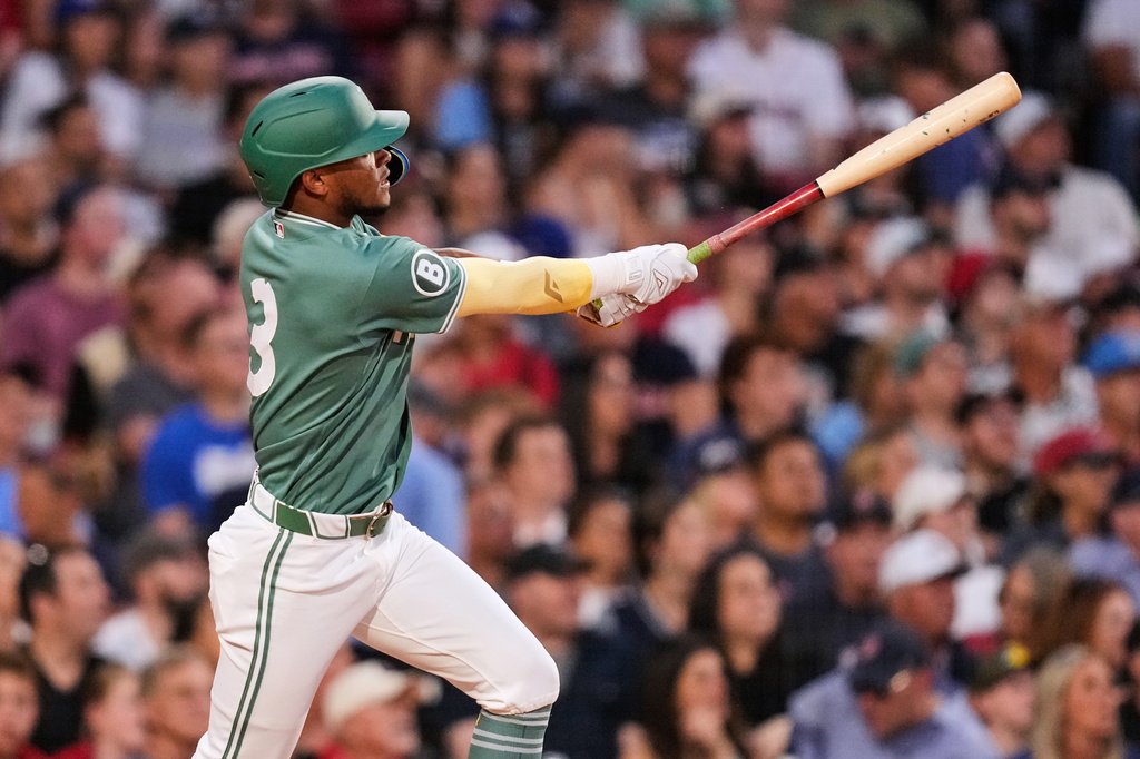 Boston Red Sox's Ceddanne Rafaela watches his two-run home run during the third inning of a baseball game against the Toronto Blue Jays, Friday, July 24, 2026, in Boston. (AP Photo/Charles Krupa)