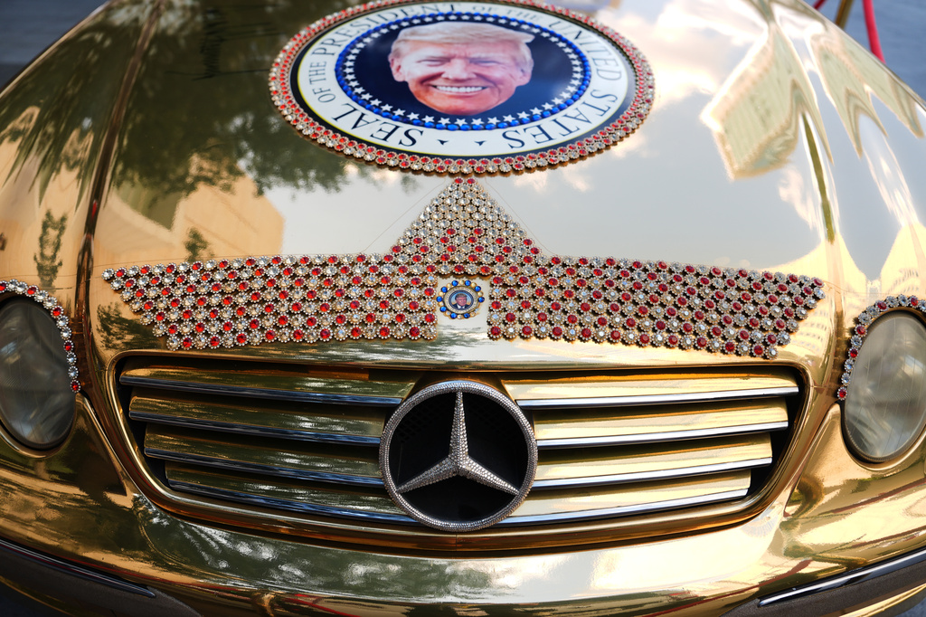 A Mercedes decorated with images of President Donald Trump is seen outside before the Republican convention Tuesday, Sept. 8, 2026, in Dallas. (AP Photo/Julia Demaree Nikhinson)