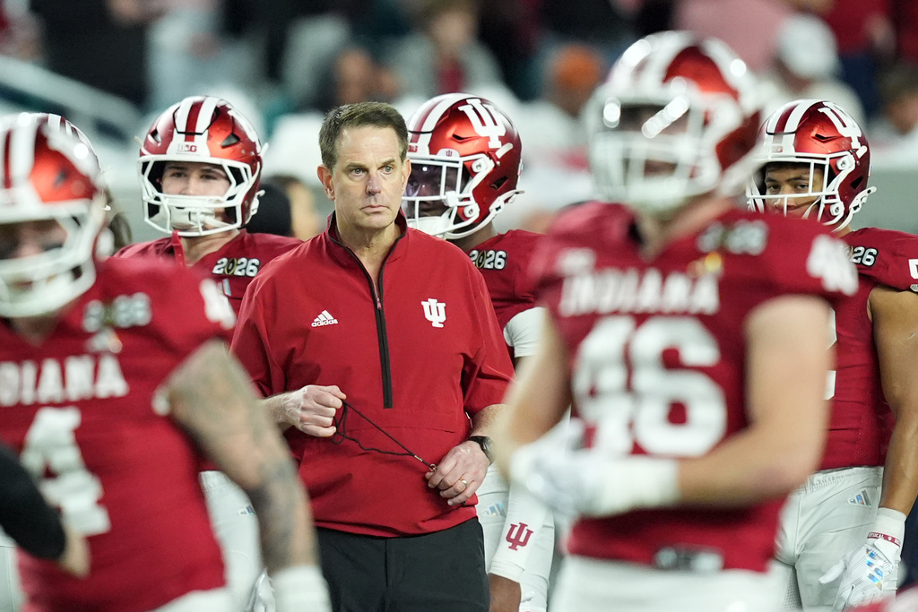 Indiana head coach Curt Cignetti watches during warm ups before the College Football Playoff national championship game between Miami and Indiana, Monday, Jan. 19, 2026, in Miami Gardens, Fla. (AP Photo/Rebecca Blackwell)