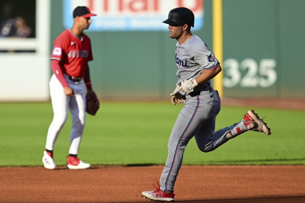 Miami Marlins' Jakob Marsee runs the bases after hitting a three-run home run off Cleveland Guardians starting pitcher Gavin Williams during the first inning of a baseball game, Wednesday, Aug. 13, 2025, in Cleveland. (AP Photo/David Dermer)